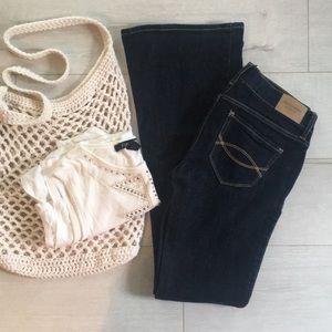 Dark denim bell bottom jeans